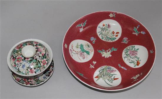A Chinese ruby ground famille rose dish, early 20th century and a rice bowl, cover and stand